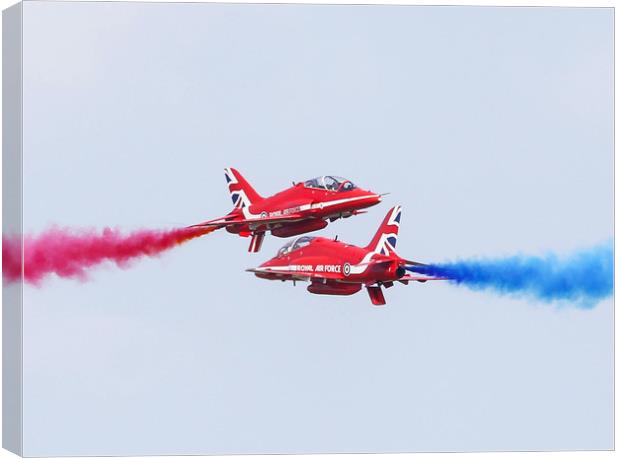Red Arrows cross over Canvas Print by Stephen Wright