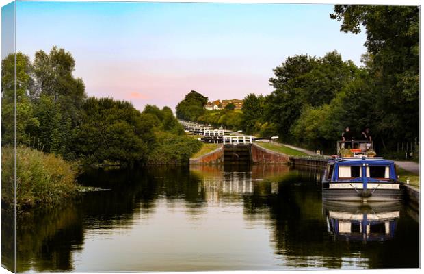 Moored at Caen Hill Locks Canvas Print by Oxon Images
