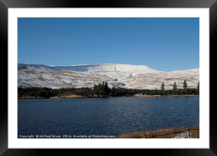 Snow covered mountains In Brecon, Wales Framed Mounted Print by michael Bryan
