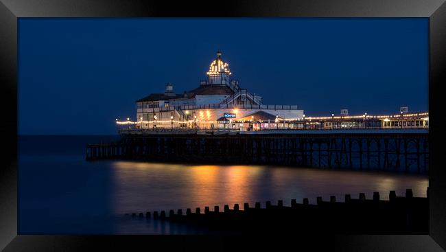 Eastbourne Pier At Night Framed Print by Dave Collins