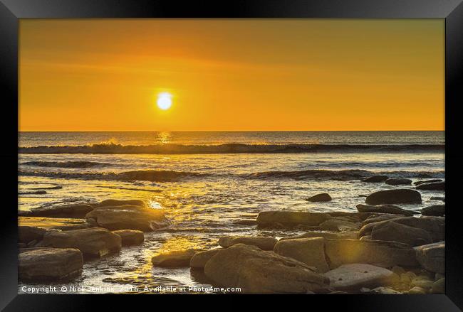 Setting Sun over Dunraven Bay Glamorgan Coast Framed Print by Nick Jenkins
