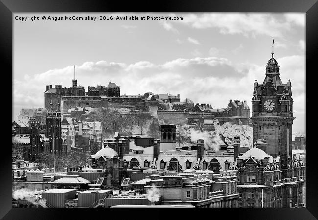 Edinburgh Castle and city skyline in snow mono Framed Print by Angus McComiskey