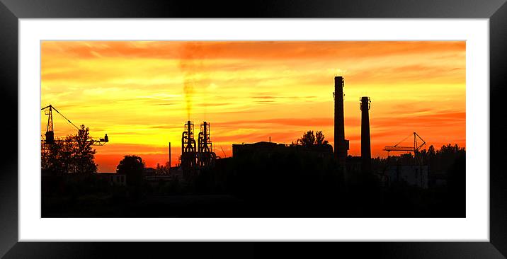 Smoking factory chimnies at sunset Framed Mounted Print by Ray Fidler