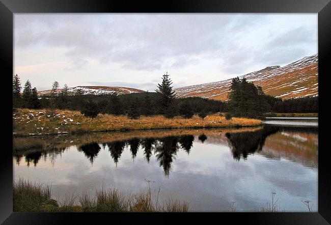 Brecon Beacon reflection. Framed Print by paulette hurley