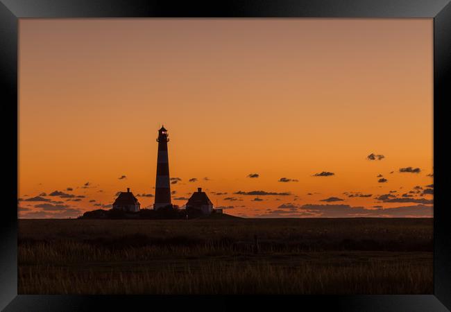 Westerhever lighthouse sunset Framed Print by Thomas Schaeffer