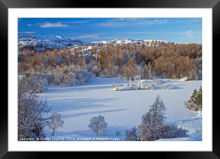 Tarn Hows Snows Framed Mounted Print by George Hopkins