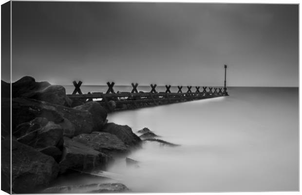 long exposure Aberaeron north beach black and whit Canvas Print by Andrew chittock