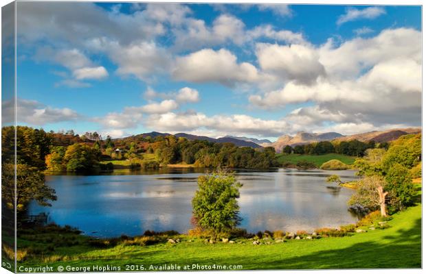 Autumn at Loughrigg Tarn Canvas Print by George Hopkins
