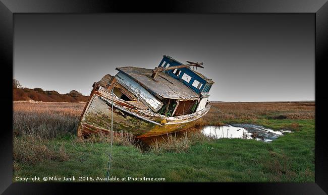 Stranded Boat Framed Print by Mike Janik