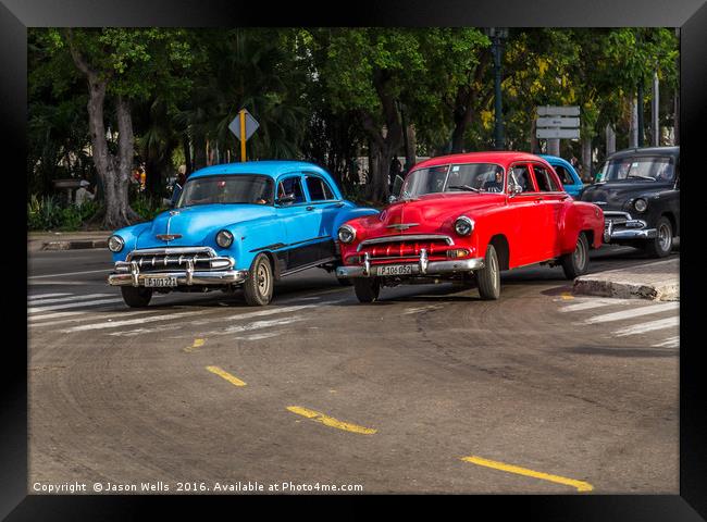 Red & blue old timers turning off Framed Print by Jason Wells