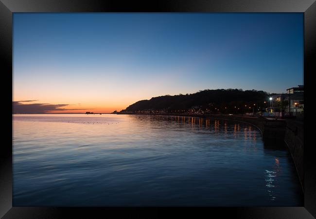 Minutes before sunrise at Mumbles. Framed Print by Bryn Morgan