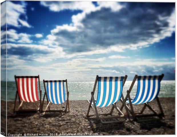Four deckchairs on the beach at Brighton, East Sus Canvas Print by Richard Harris