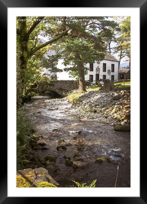 Cottage by stream Framed Mounted Print by Kevin White