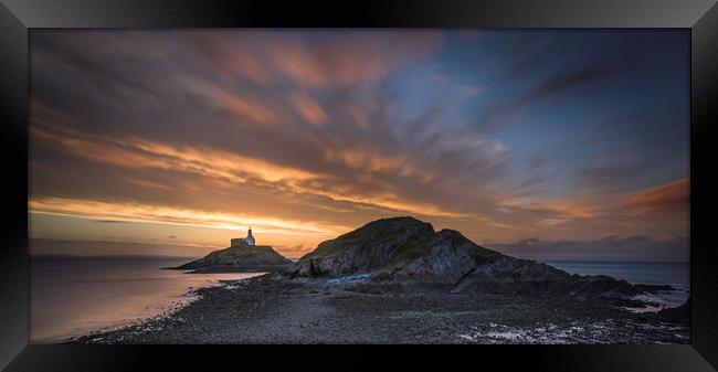 Sunrise at Mumbles lighthouse. Framed Print by Bryn Morgan