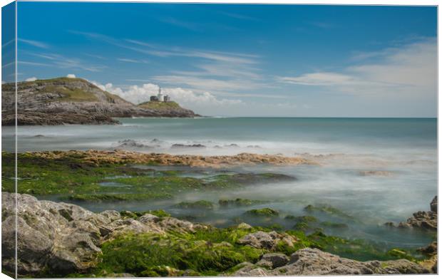 Mumbles lighthouse a with misty sea. Canvas Print by Bryn Morgan