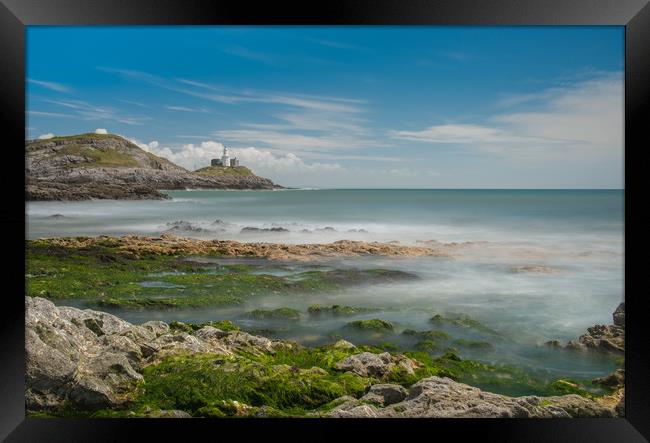 Mumbles lighthouse a with misty sea. Framed Print by Bryn Morgan