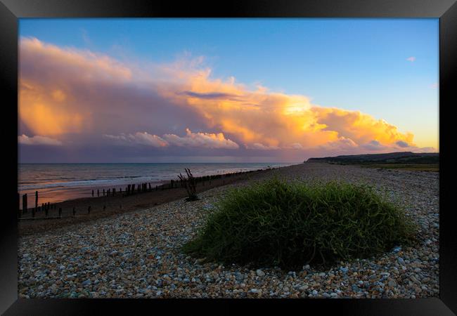 Storm clouds at Winchelsea Beach Framed Print by Oxon Images