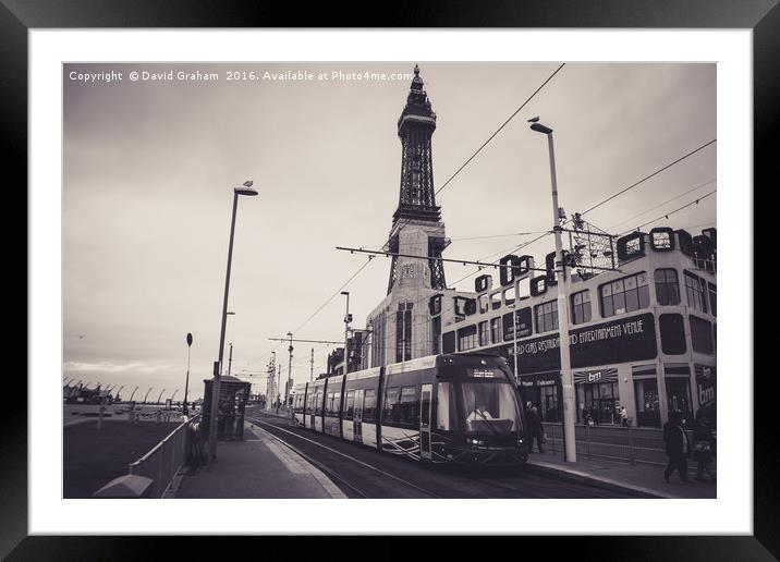 Tram at Blackpool Tower Tram stop Framed Mounted Print by David Graham