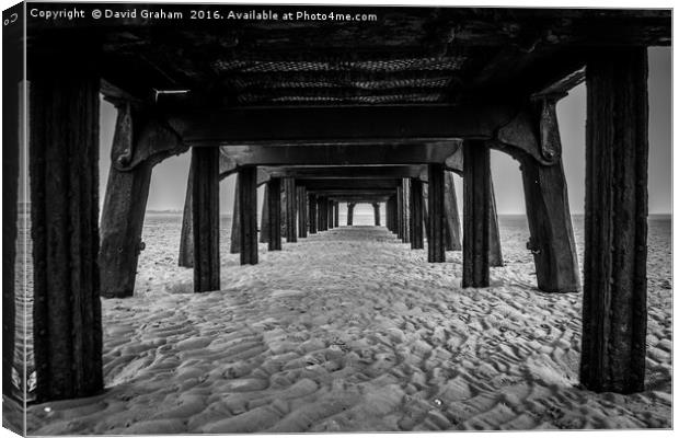 Underside of old Jetty at St Annes beach Canvas Print by David Graham