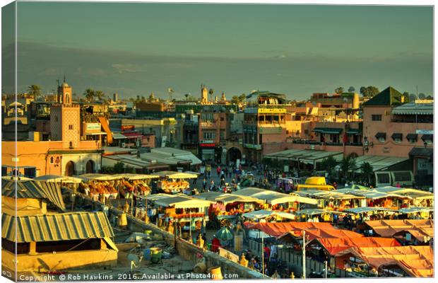 The marketplace of Marrakesh,  Canvas Print by Rob Hawkins