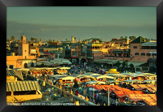 The marketplace of Marrakesh,  Framed Print by Rob Hawkins