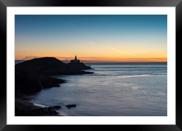 Mumbles lighthouse at sunrise.  Framed Mounted Print by Bryn Morgan