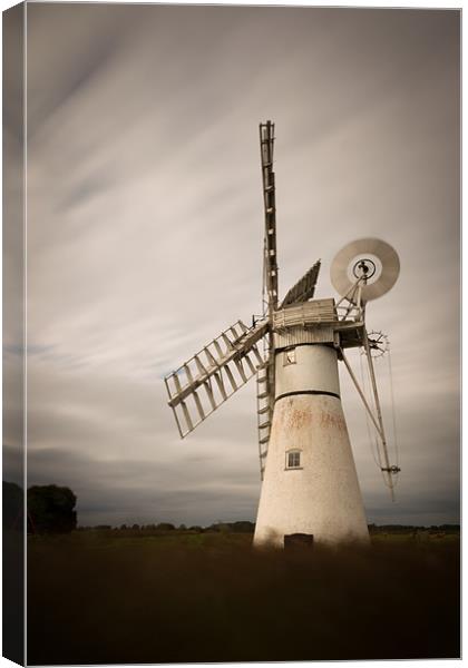 Windy Windmill Canvas Print by Simon Wrigglesworth