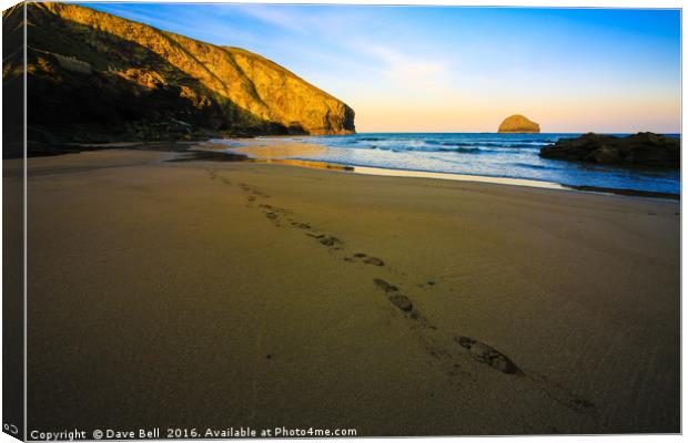 Foot prints in the sand at Trebarwith Strand Canvas Print by Dave Bell