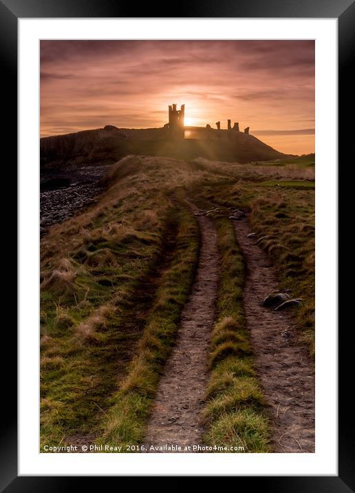 Dunstanburgh Castle at sunrise Framed Mounted Print by Phil Reay