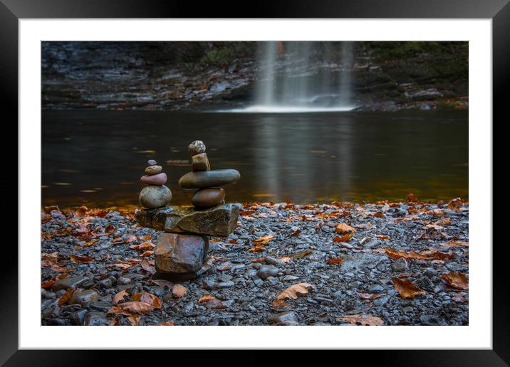 Stacking stones at the Lady Falls. Framed Mounted Print by Bryn Morgan