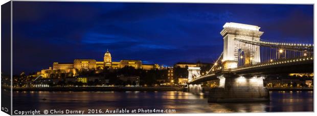 Buda Castle, the Chain Bridge and the River Danube Canvas Print by Chris Dorney