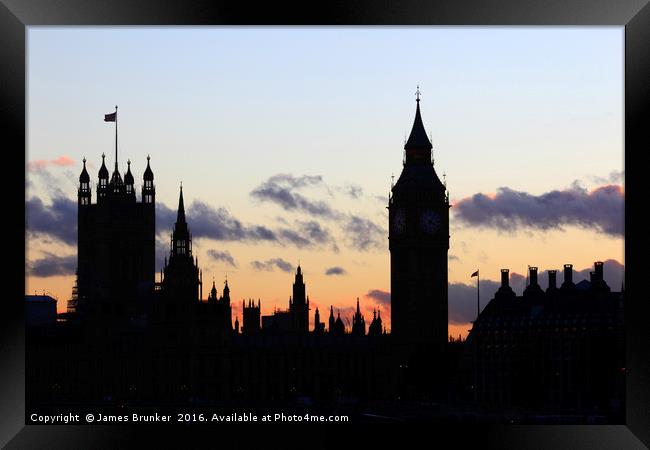 Towers of Houses of Parliament at sunset London Framed Print by James Brunker