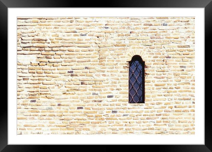 Old Castle Window On Brick Wall Framed Mounted Print by Radu Bercan