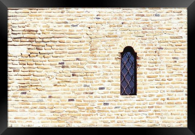 Old Castle Window On Brick Wall Framed Print by Radu Bercan