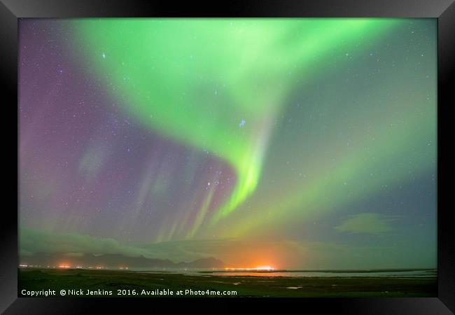 Aurora over south Iceland at the town of Hofn Framed Print by Nick Jenkins