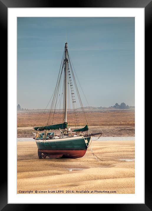 Sail boat stranded at low tide on sand Framed Mounted Print by Simon Bratt LRPS