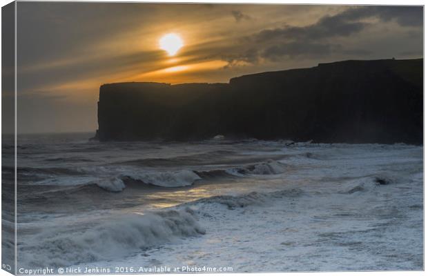 Sunset at Dyrholaey in Iceland Canvas Print by Nick Jenkins