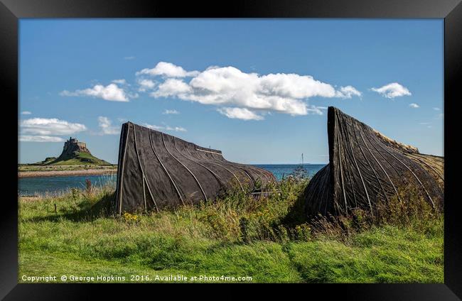 The Upturned Boats of Lindisfarne Island Framed Print by George Hopkins