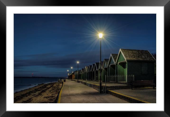 Beach Huts at Gurnard bay at dusk Framed Mounted Print by David Oxtaby  ARPS