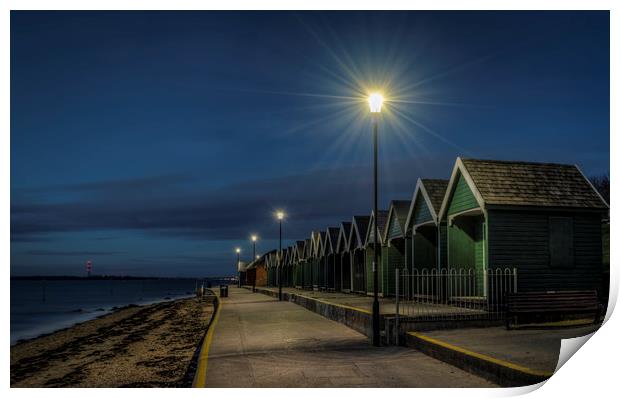 Beach Huts at Gurnard bay at dusk Print by David Oxtaby  ARPS