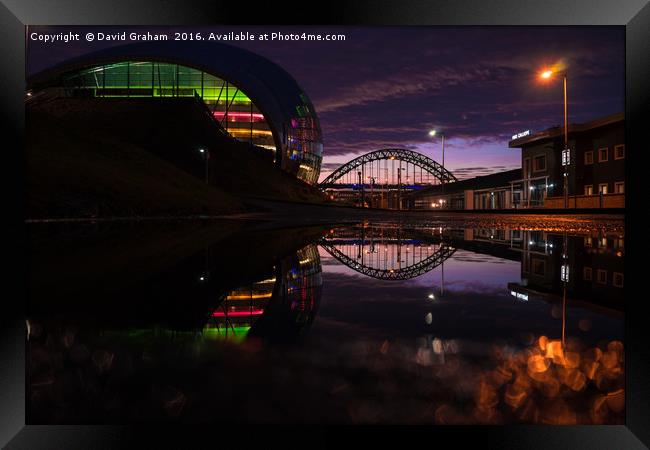 Sage Gateshead & Tyne Bridge reflected in puddle Framed Print by David Graham