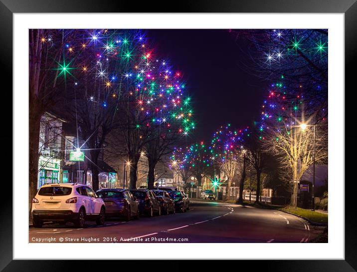 Ripley at night with Christmas lights Framed Mounted Print by Steve Hughes