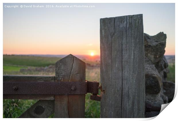 Sunset taken through gate post Print by David Graham