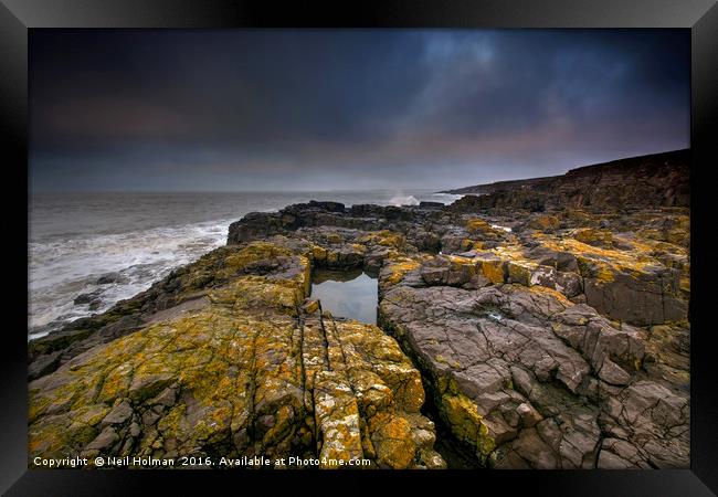Lichen Covered Rocks at Ogmore by Sea Framed Print by Neil Holman