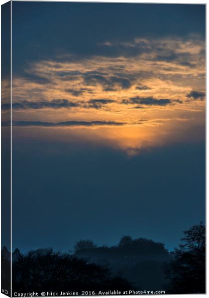 Setting Sun on a winter Evening Canvas Print by Nick Jenkins