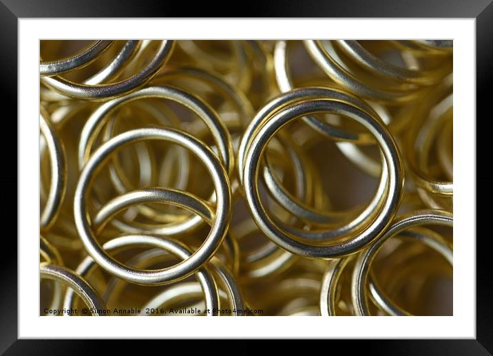 Gold Rings Framed Mounted Print by Simon Annable