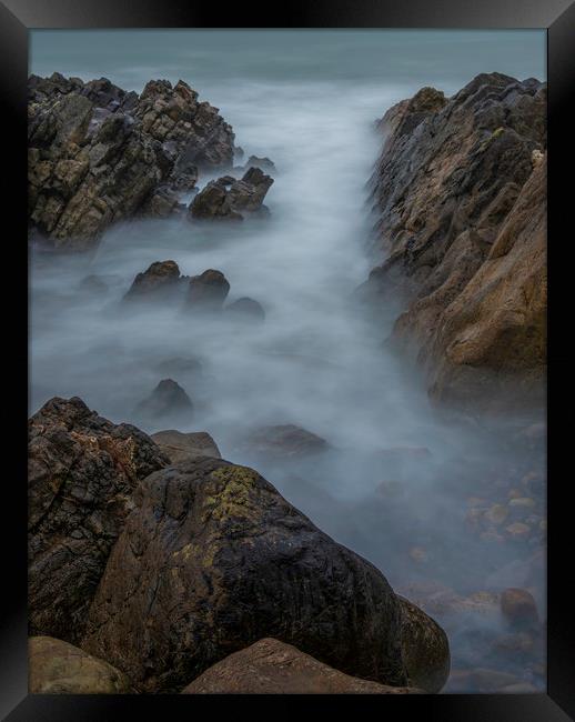 Misty water at Rotherslade bay. Framed Print by Bryn Morgan