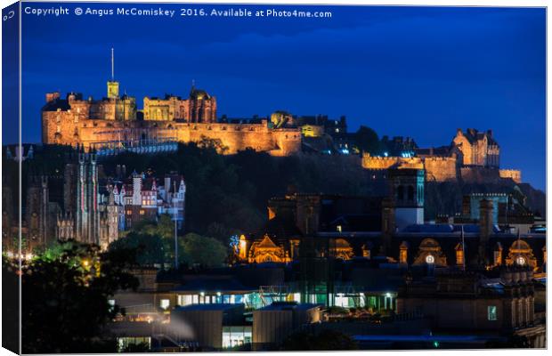 Edinburgh Castle at twilight Canvas Print by Angus McComiskey