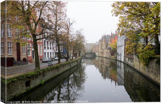 Brugge in the mist  Canvas Print by Rob Hawkins