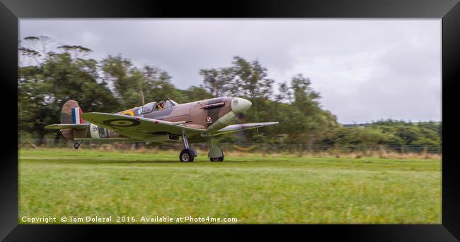 Low down for a Spitfire take-off Framed Print by Tom Dolezal